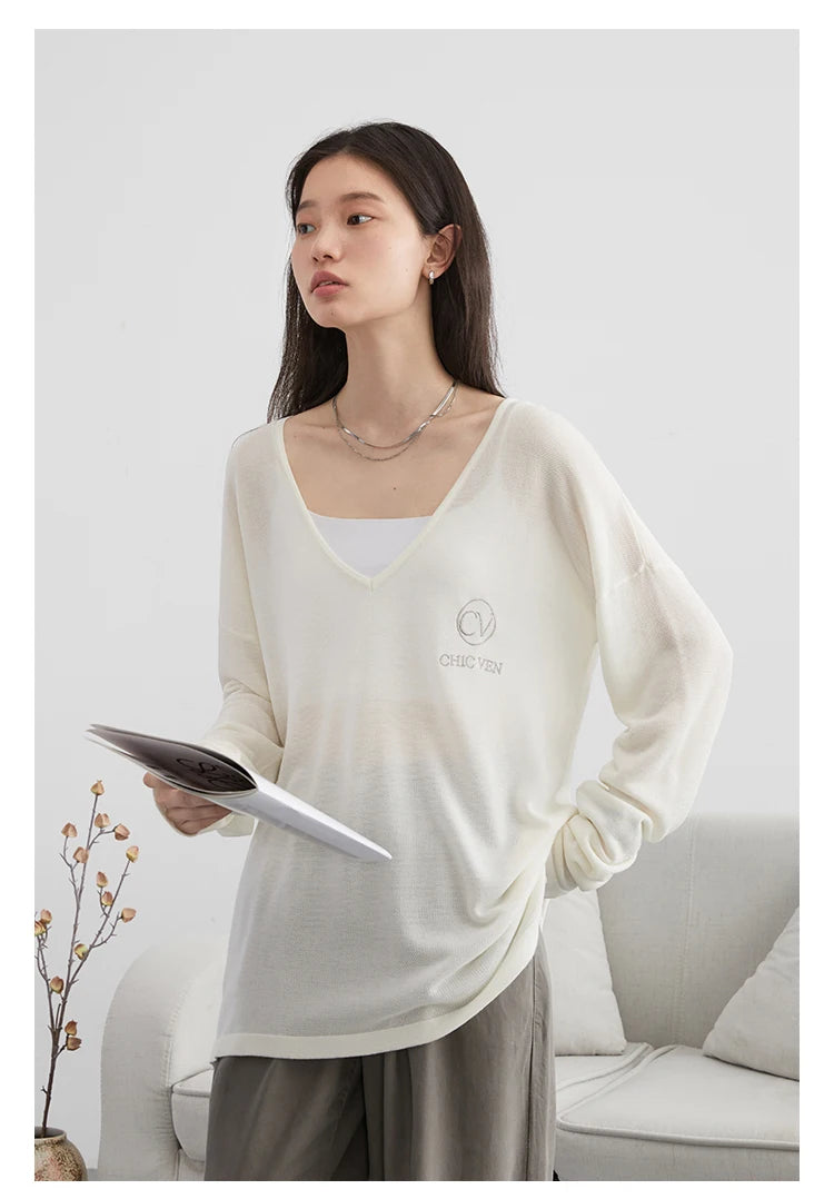 Elevate your wardrobe with our Loose V-Neck Embroidered T-Shirt, the perfect blend of comfort and style for Spring/Summer 2024. Crafted from lightweight, breathable fabric, this tee provides natural sun protection while keeping you cool. The