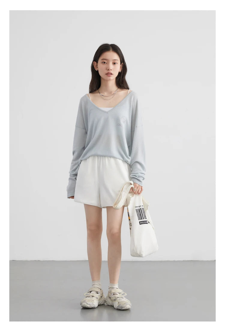 Stylish Loose V-Neck Embroidered T-Shirt crafted from lightweight, breathable fabric that offers comfort and protection. Featuring elegant embroidery and a loose fit silhouette, this tee flatters all body shapes while ensuring effortless movement. Perfect for Spring/Summer