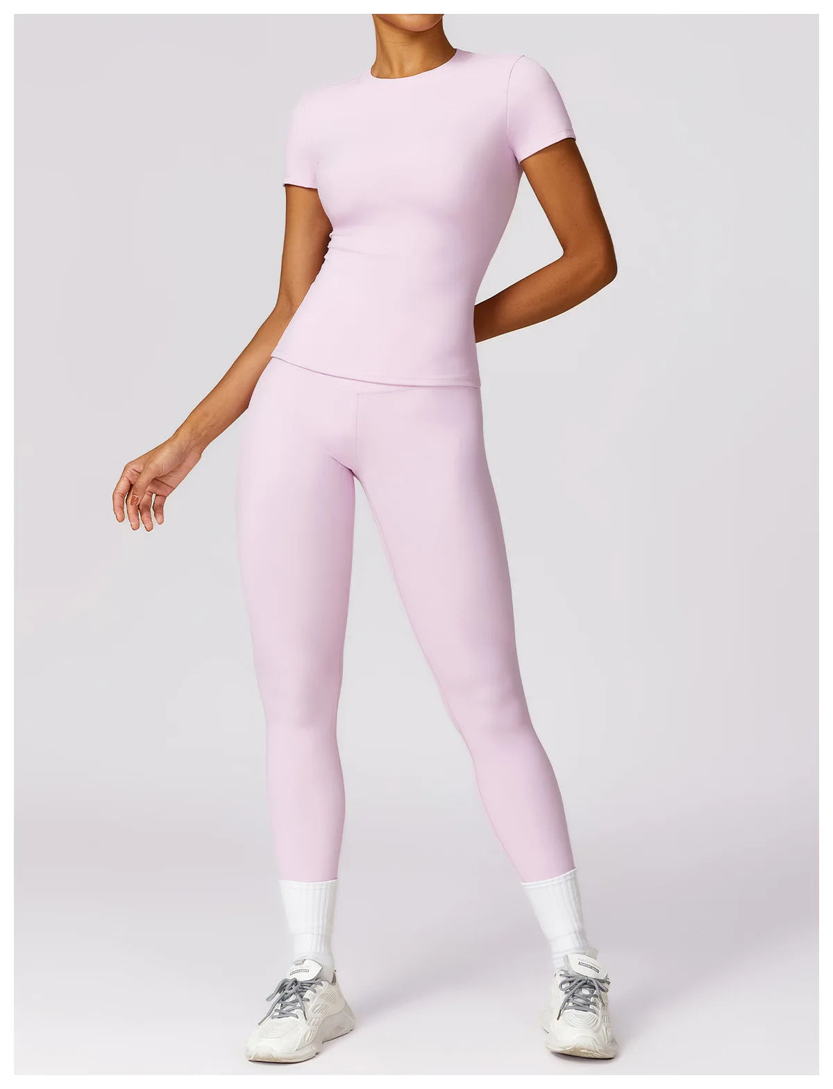 Elevate your fitness wardrobe with the NCLAGEN Short Sleeve T-Shirt! This stylish and breathable top is crafted from lightweight nylon, ensuring maximum comfort during workouts, yoga sessions, or casual outings. The fitted silhouette and round neck design flatter your figure while