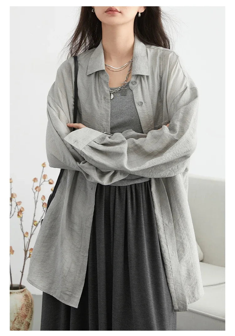 Discover the ultimate summer essential with our **Textured Long Sleeve Blouse with Split Collar**. This stylish blouse features a playful tie-dye pattern and is crafted from soft, breathable fabric for all-day comfort. Its modern split collar and long sleeves make