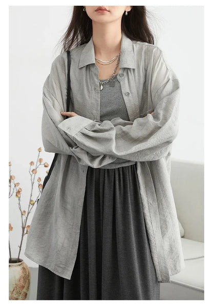 Discover the ultimate summer essential with our **Textured Long Sleeve Blouse with Split Collar**. This stylish blouse features a playful tie-dye pattern and is crafted from soft, breathable fabric for all-day comfort. Its modern split collar and long sleeves make