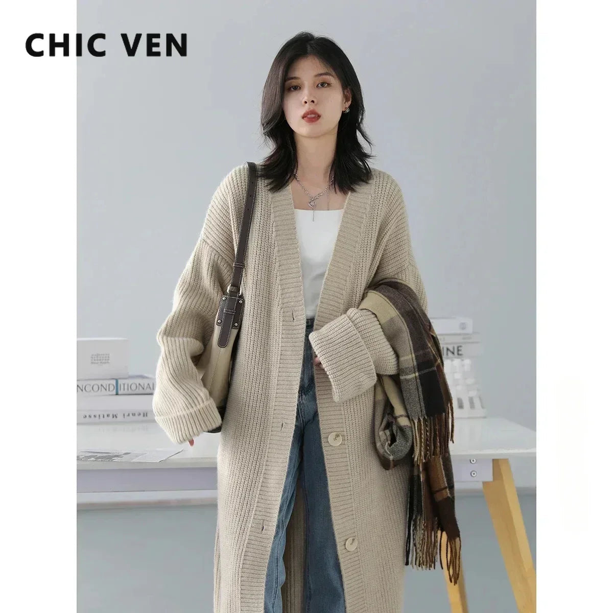 Elevate your wardrobe with the Korean Loose Knitted Cardigan & Long Coat, designed for effortless sophistication. This oversized cardigan features luxuriously soft knitted fabric, ensuring all-day comfort while flattering every figure. With a timeless button closure and available in neutral