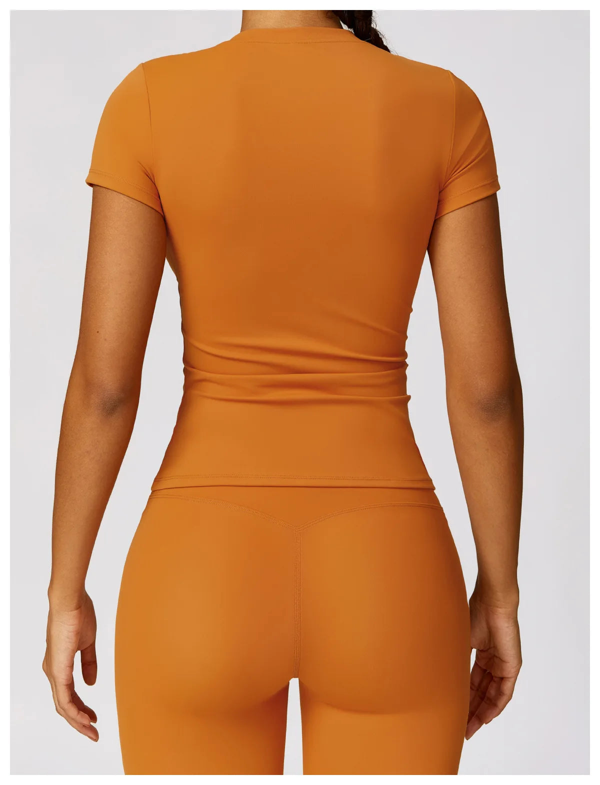 Elevate your fitness wardrobe with the NCLAGEN Short Sleeve T-Shirt! This stylish top features lightweight, breathable nylon for ultimate comfort during workouts, yoga, or casual outings. The fitted silhouette and round neck design flatter your figure while providing freedom of movement